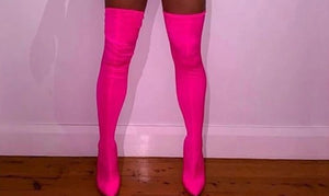 Orange thigh high boots